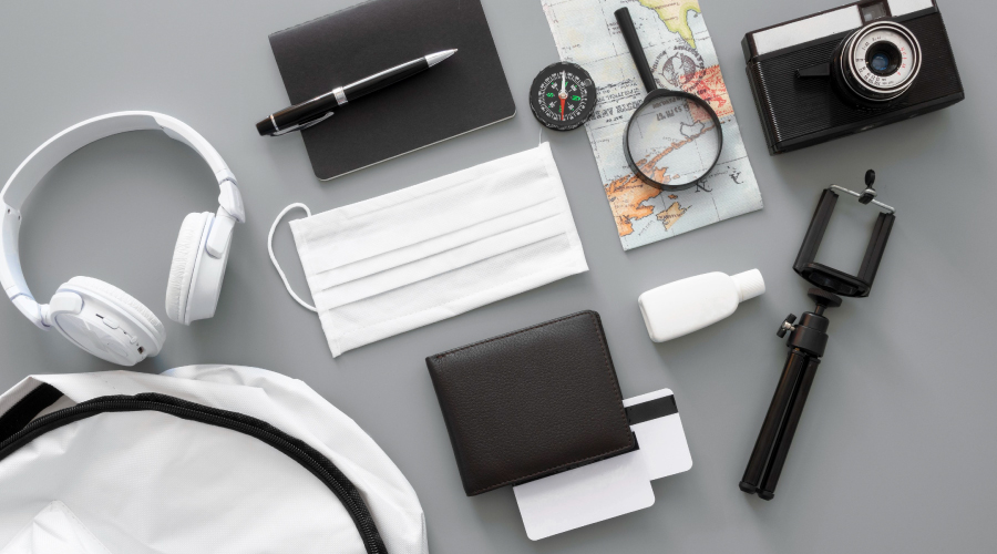 A different promotional products from a supplier are laid out on the table.