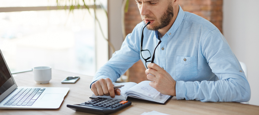 A company representative is reviewing the company's expenses on promotional products.
