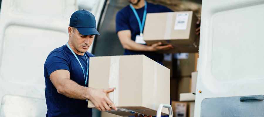 Employees of Faddico are loading promotional products to deliver them on time to customers.