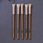 A various Eco-Friendly pens with customized logo made by Faddico are placed on table.