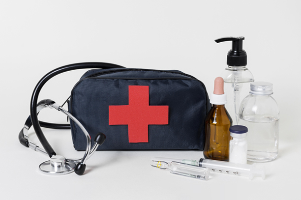 A health and wellness promotional first add kit with hand sanitizer and other medicines.