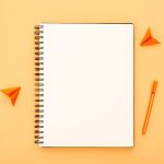 A white color notebook for event manager can be customized by Faddico for business promotion.