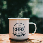 Customized coffee mug is placed on the table.