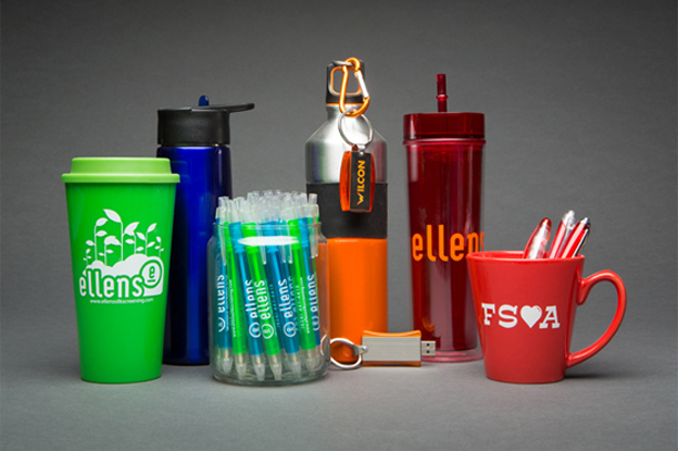 Water bottles, and other office promotional cups are placed very neatly.