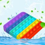 Multicolor stress relievers are placed together in a tray.