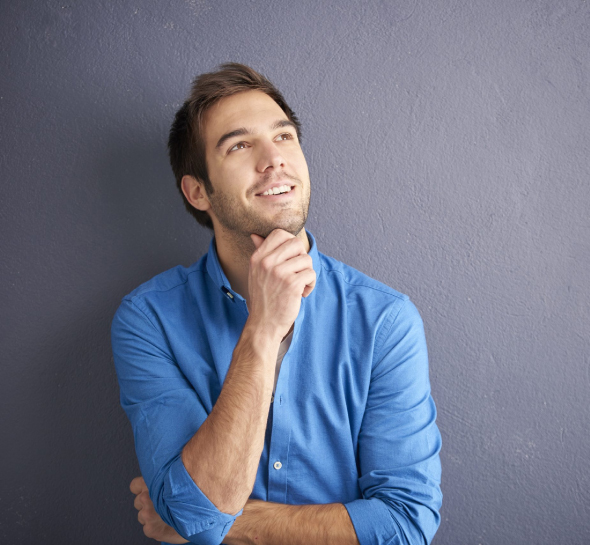 A man wearing blue shirt thinking about something.